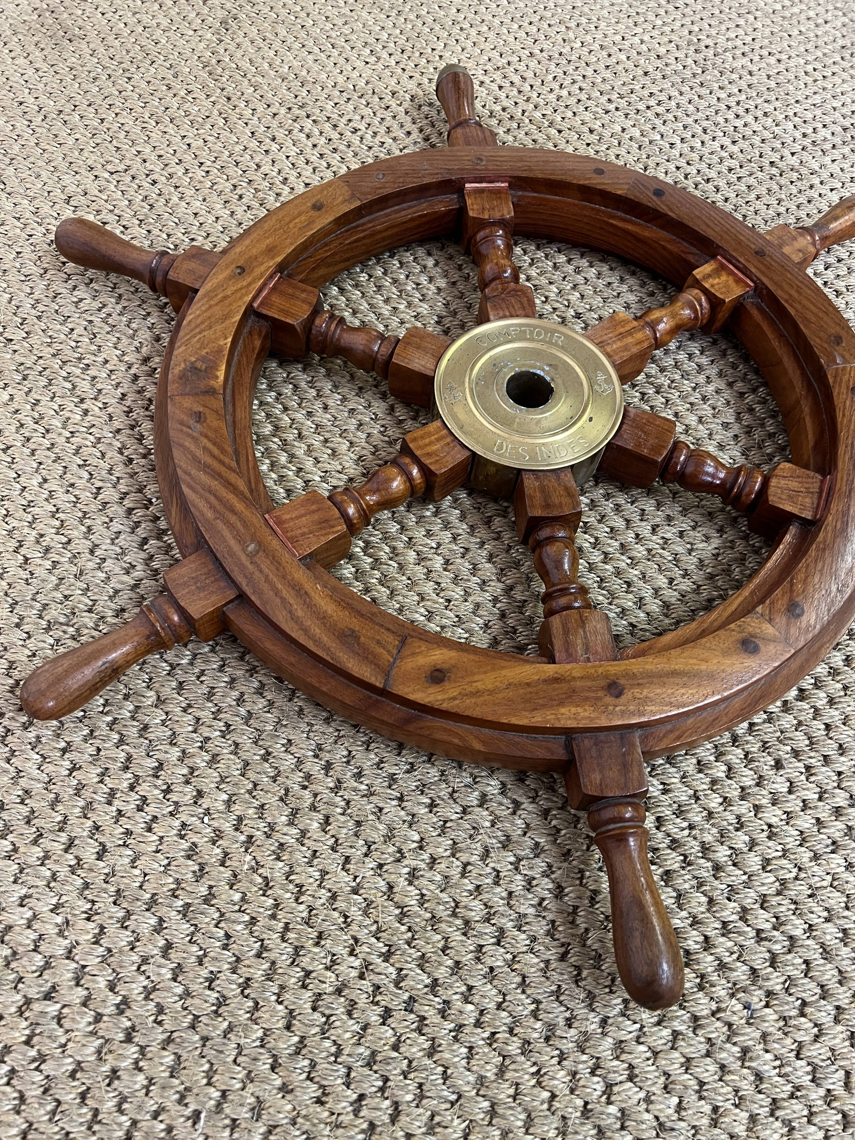 Rudder bar wheel boat in wood and brass "Comptoir des Indes" shelf