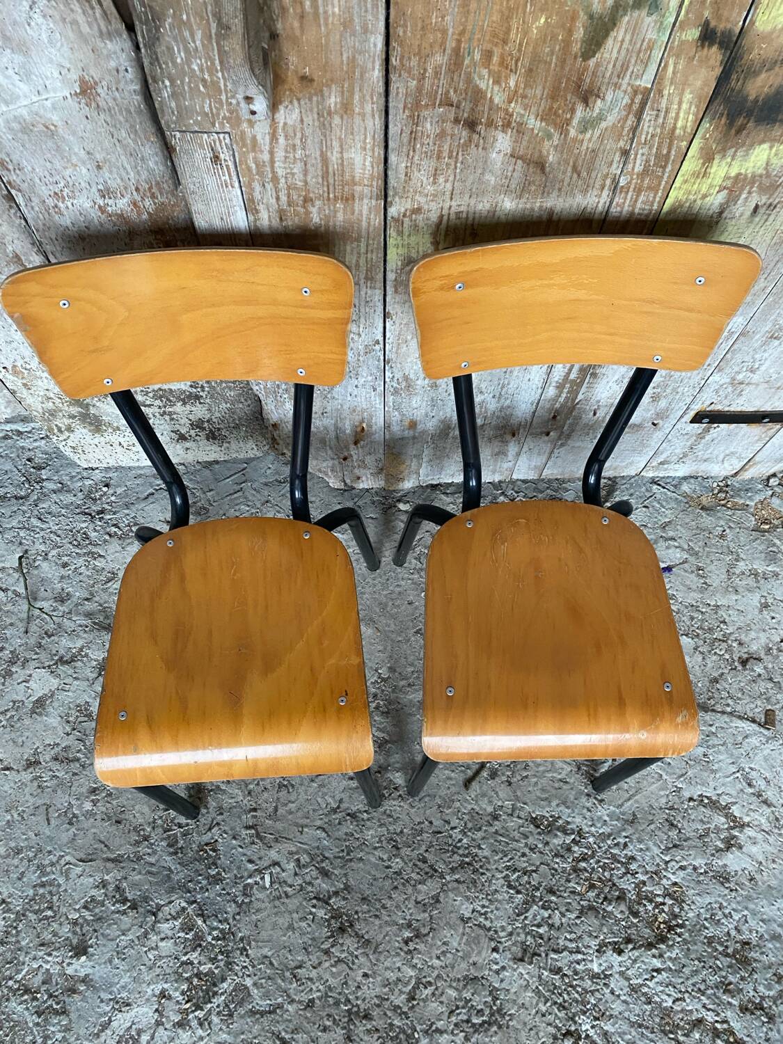 Pair of antique chairs in black metal + wooden seat & back