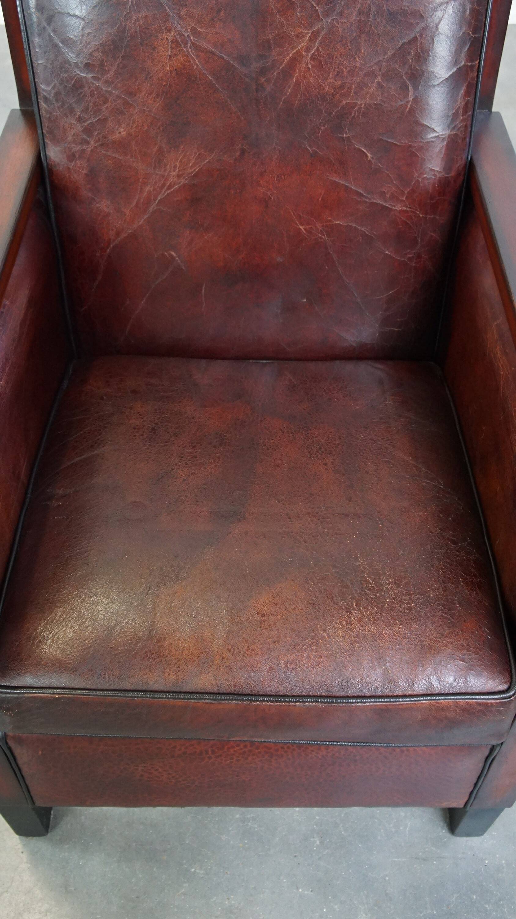 Sheepskin Art Deco design armchair combined with wood