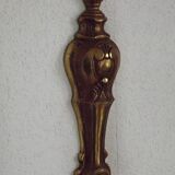 Simple wall sconce in classic Empire style in vintage French bronze.