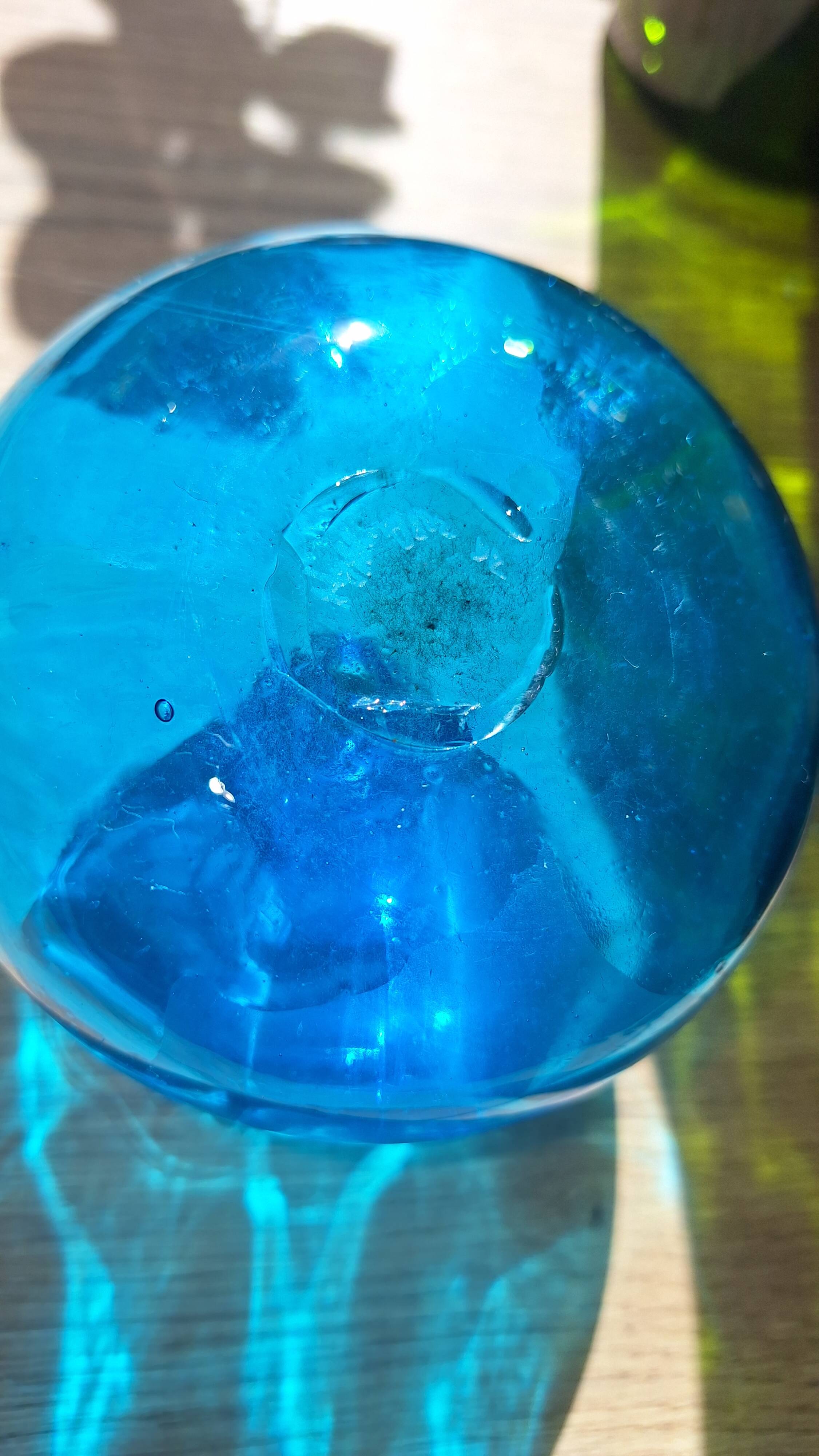 Turquoise blue blown glass vase
