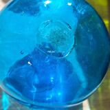 Turquoise blue blown glass vase