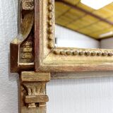 Miroir en bois doré, style Louis XVI – 1ère partie XXe - 60x30cm