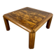 Old coffee table with golden marble top, 70s design, vintage wooden feet