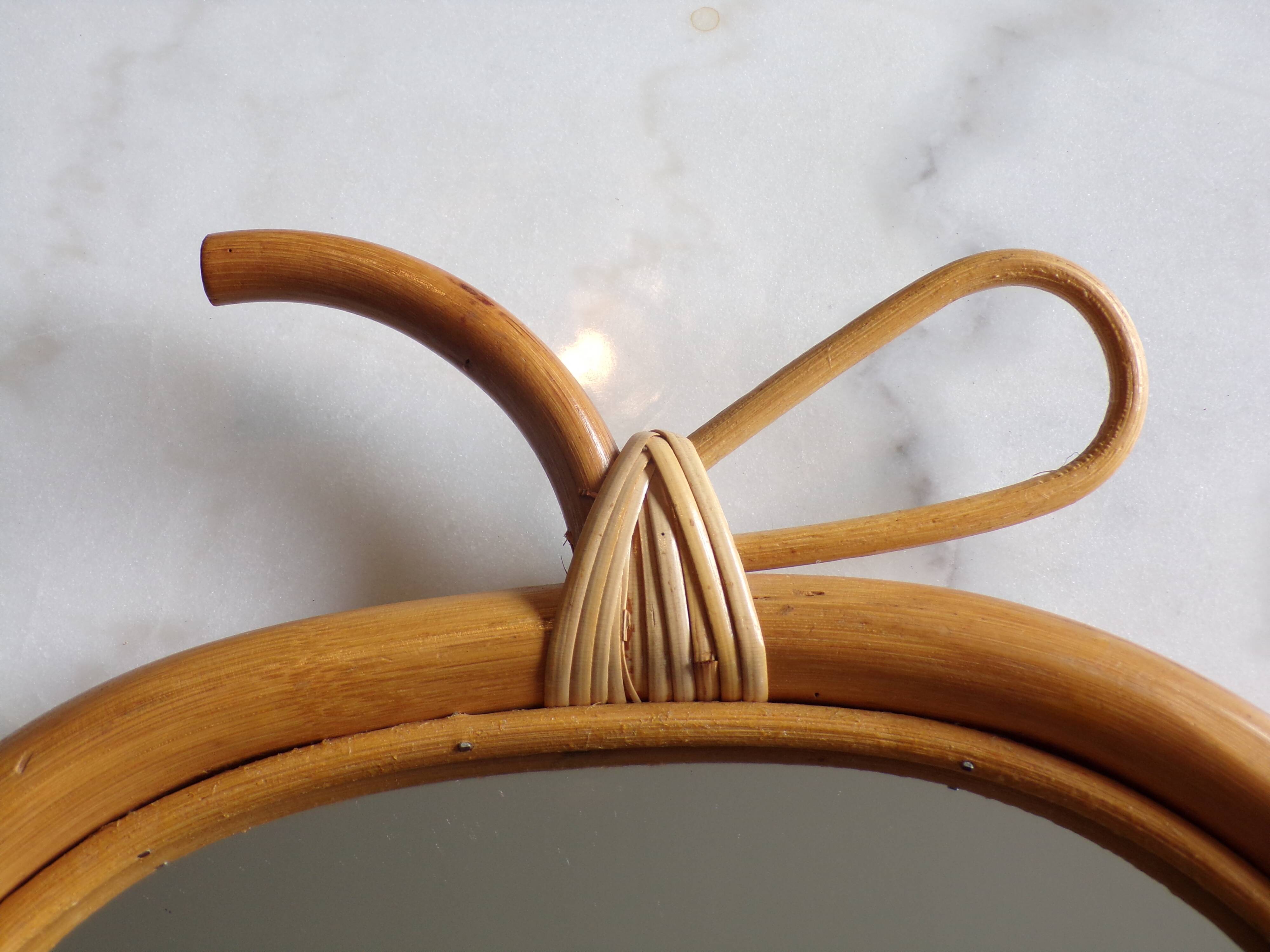 Vintage rattan apple mirror