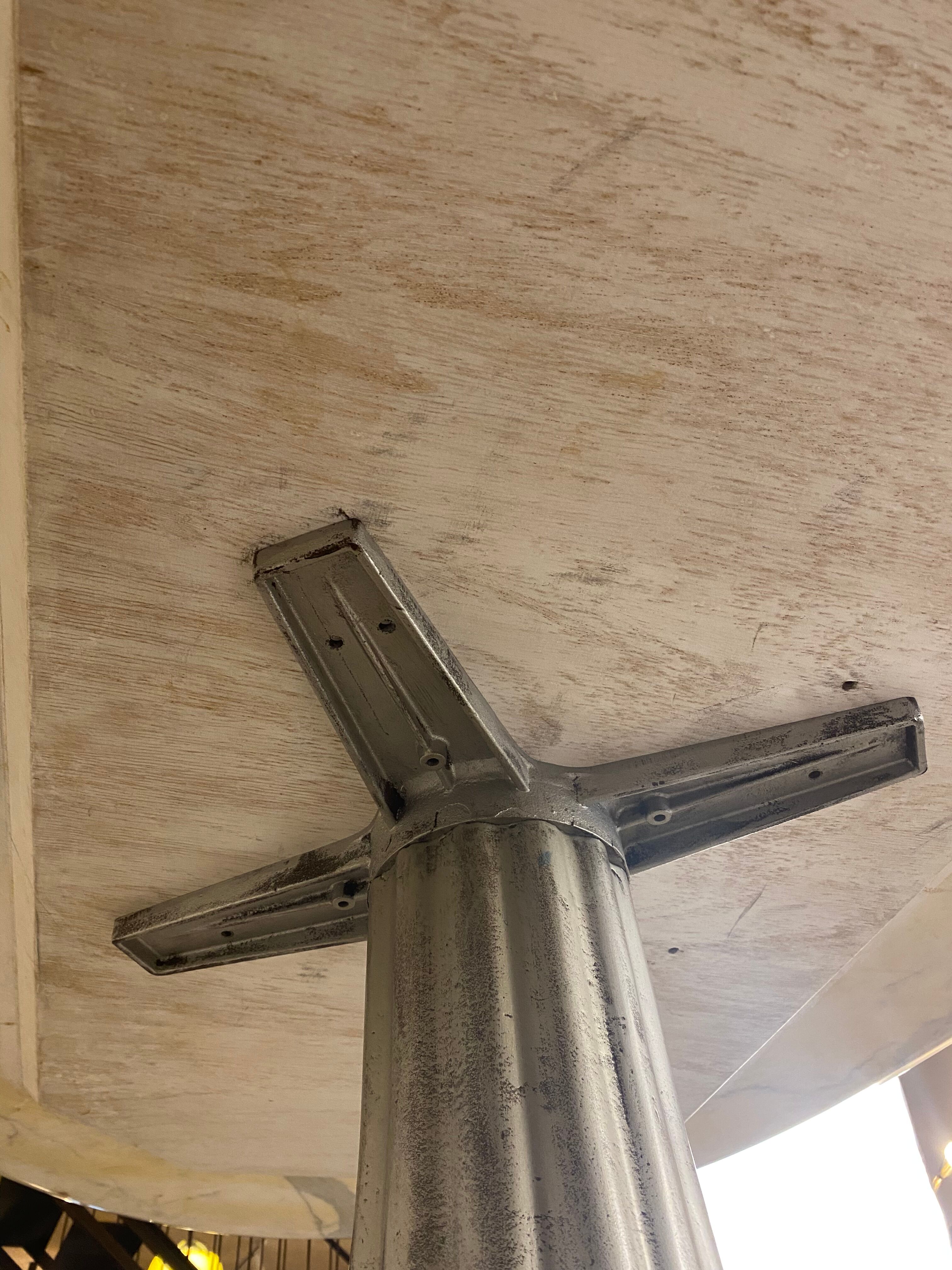 Oval marble dining table with iron base