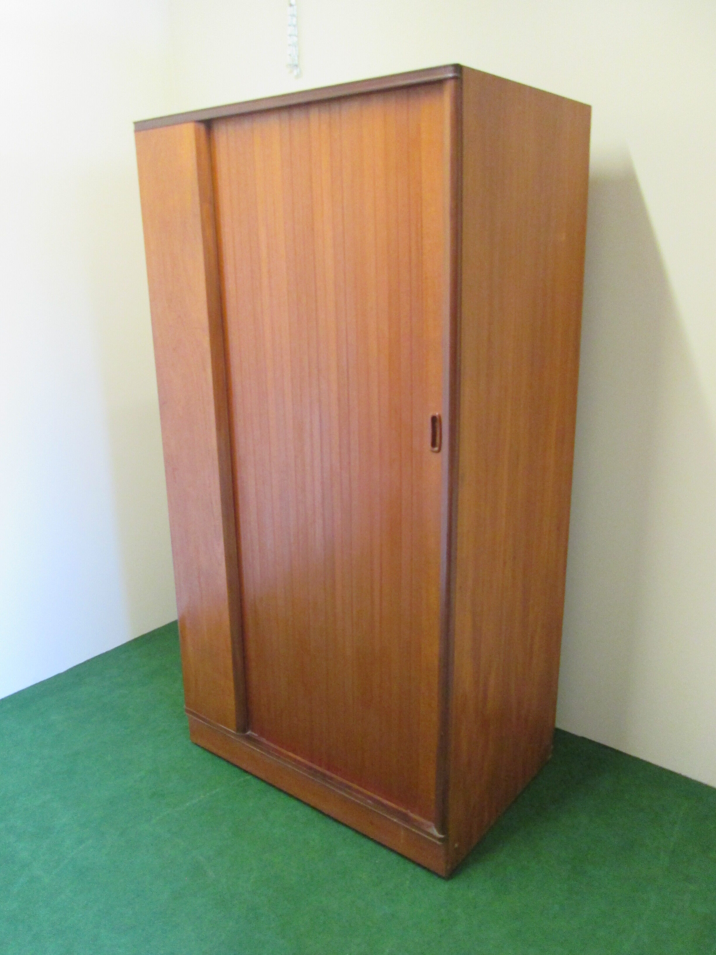 Teak cabinet with shuttered sliding door