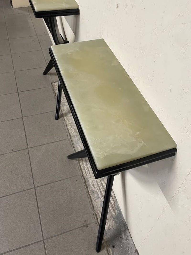 Console from the 1950s in ebonised wood and green marble.