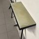 Console from the 1950s in ebonised wood and green marble.