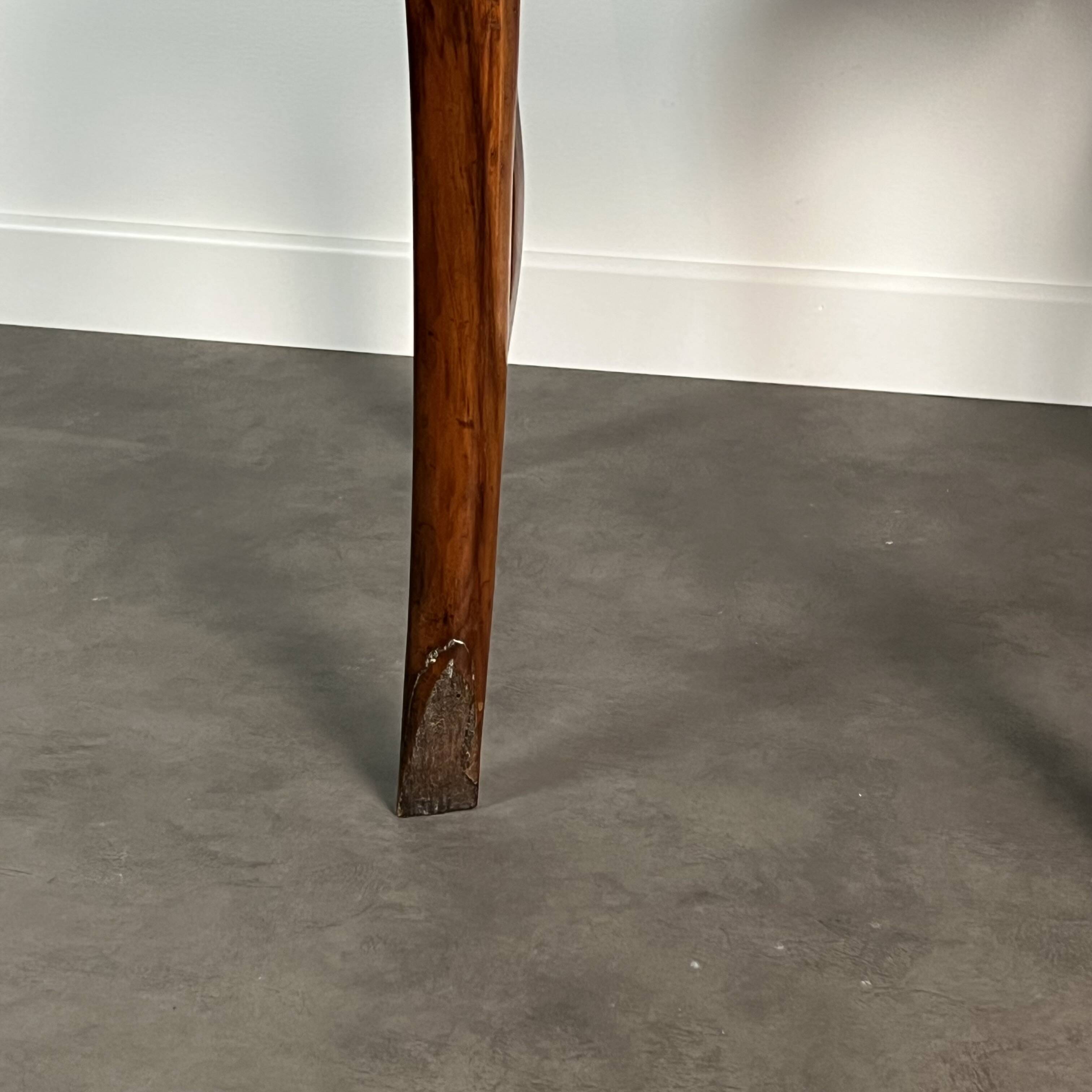 Pair of Victorian English chairs known as balloon chairs in solid mahogany.