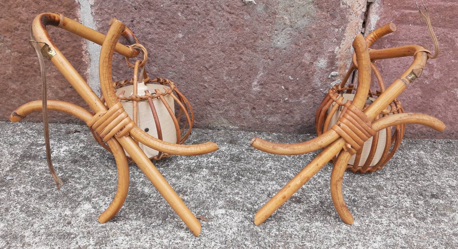 Pair of Louis Sognot rattan wall lights.