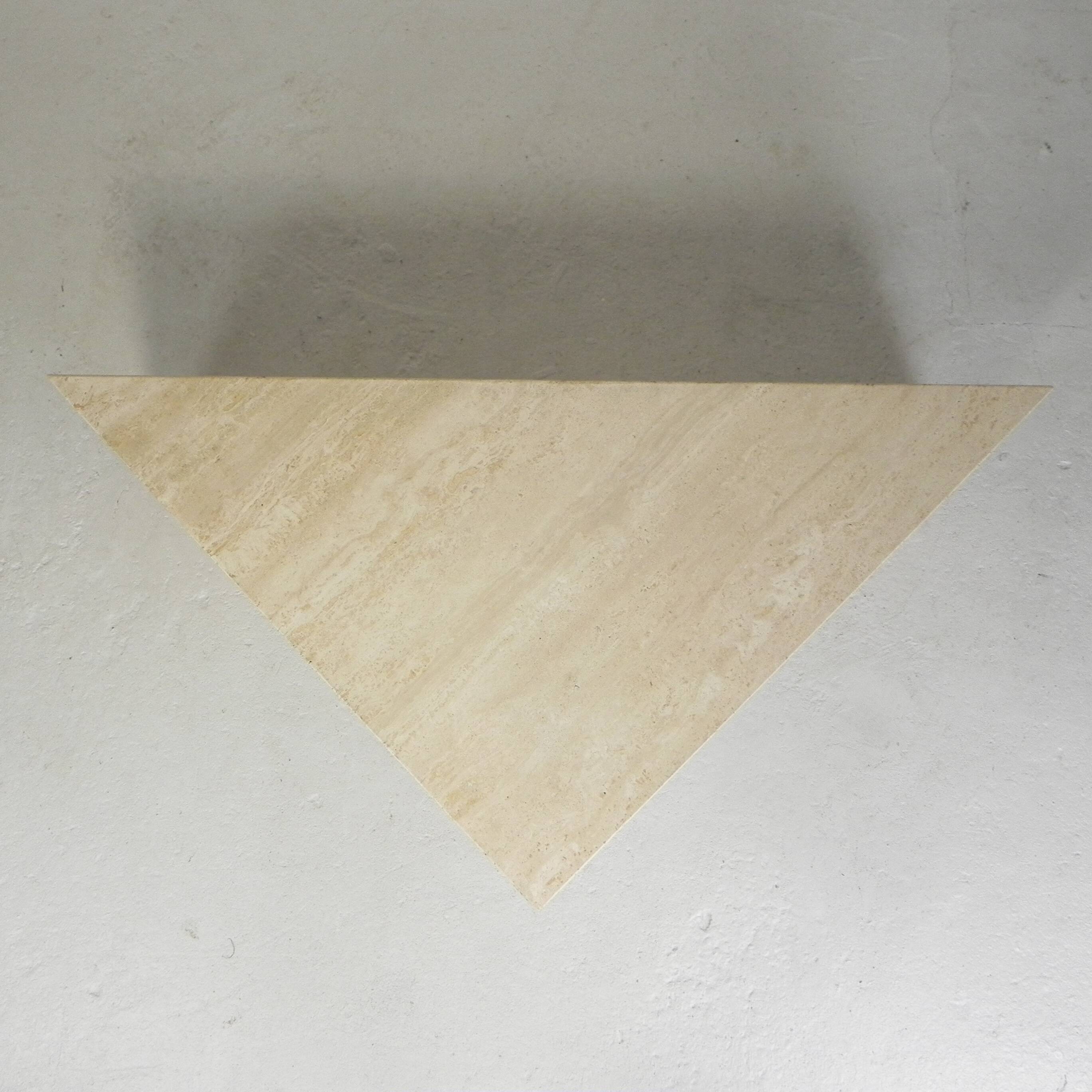 Mid-Century travertine coffee table with a triangular top, 1970s.