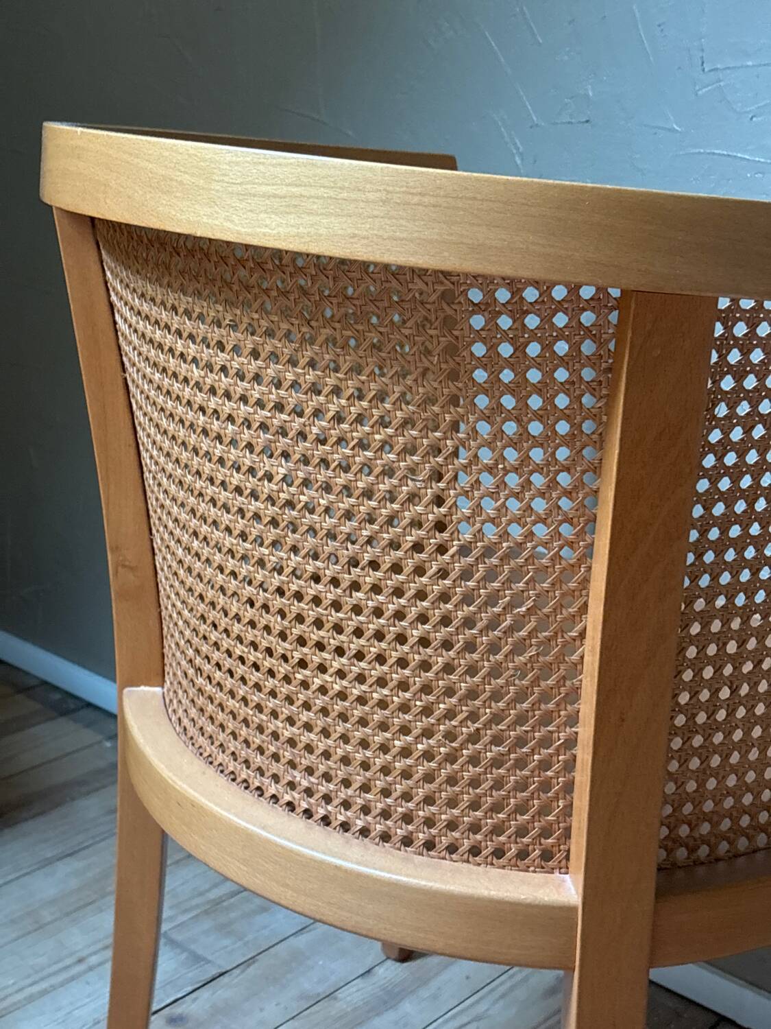 Wooden and cane cabriolet armchair