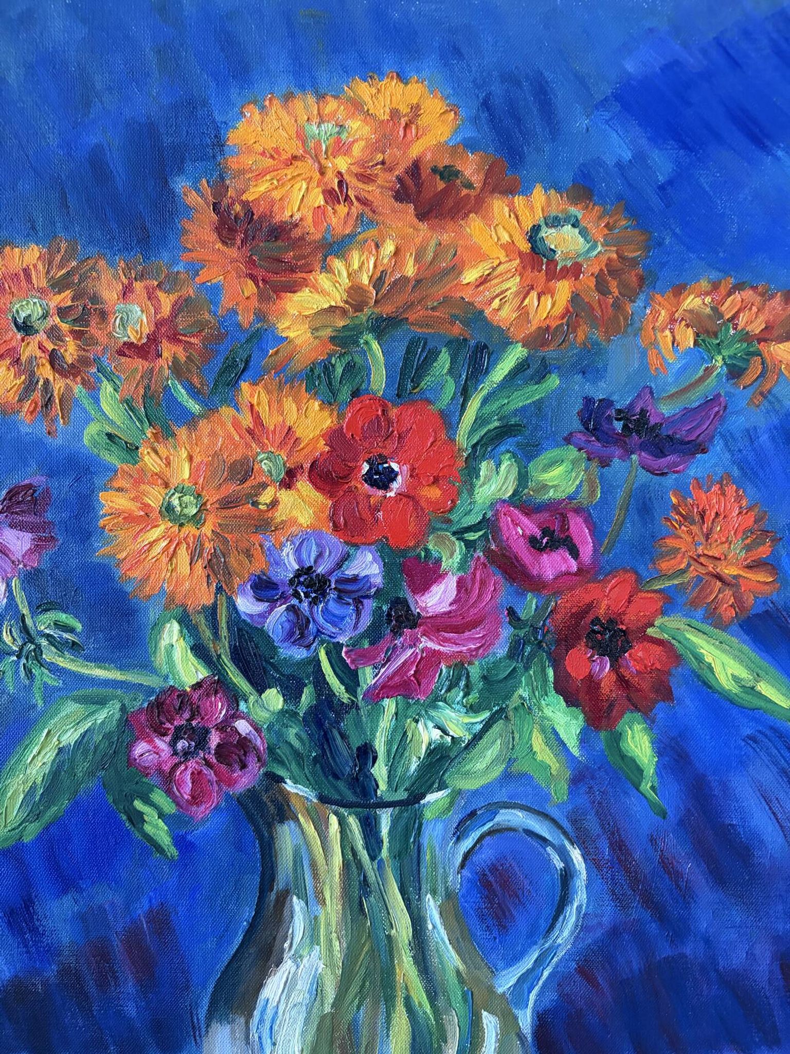 Anemones and marigolds, oil on canvas signed Gisèle Renaut.