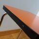 Chrome metal and orange formica stool
