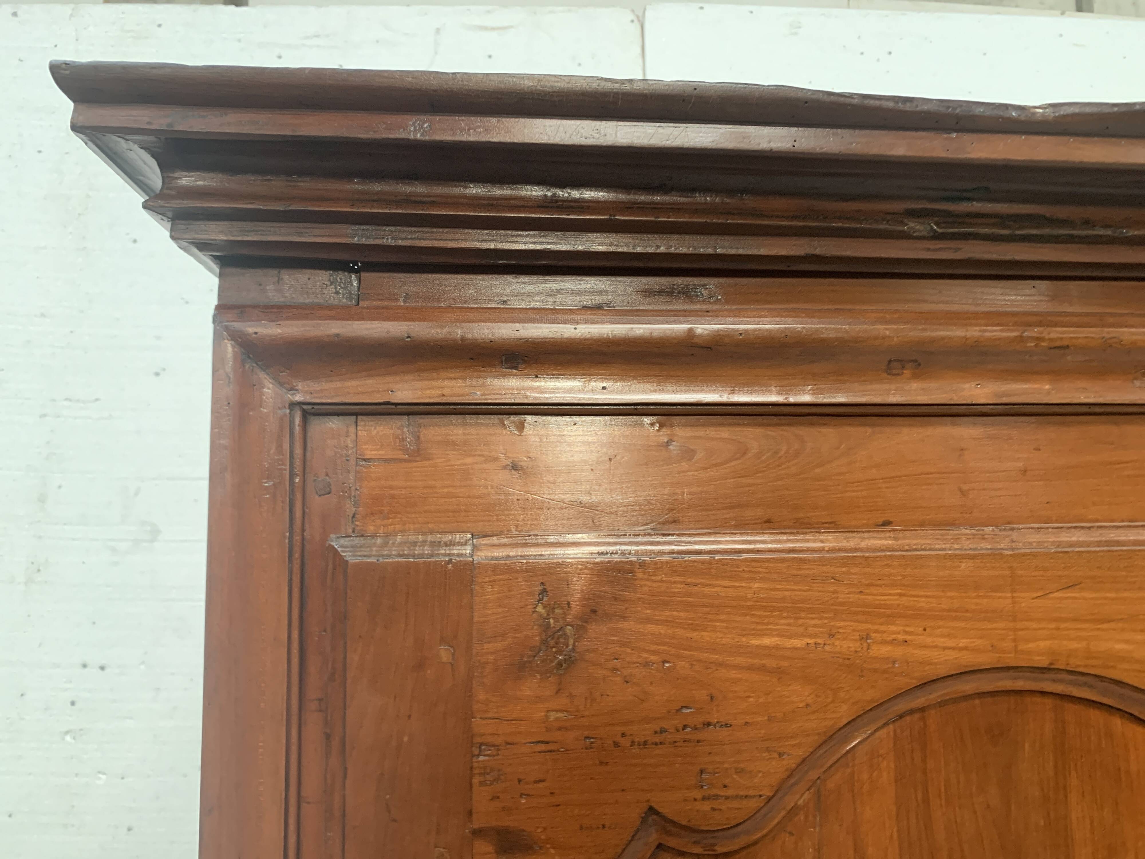 Louis Philippe style bonnetière in solid cherry wood, 19th century