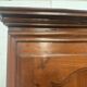 Louis Philippe style bonnetière in solid cherry wood, 19th century