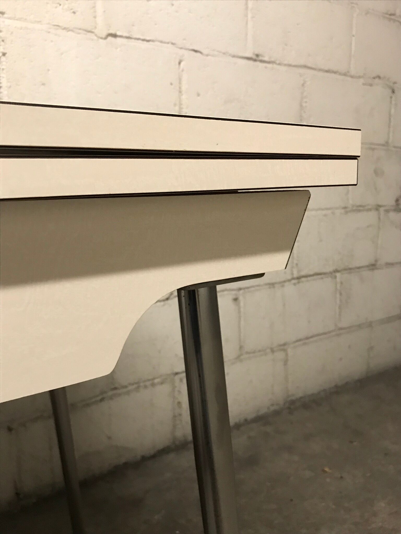 Off-white formica table / 70s cream with a tapered foot drawer