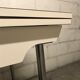 Off-white formica table / 70s cream with a tapered foot drawer