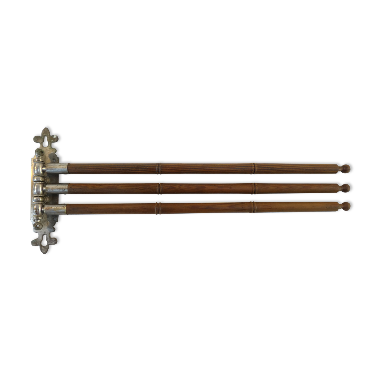Antique towel rack has three arms