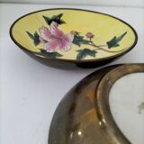 Pair of vintage Chinese decorative plates with floral decoration on a yellow background