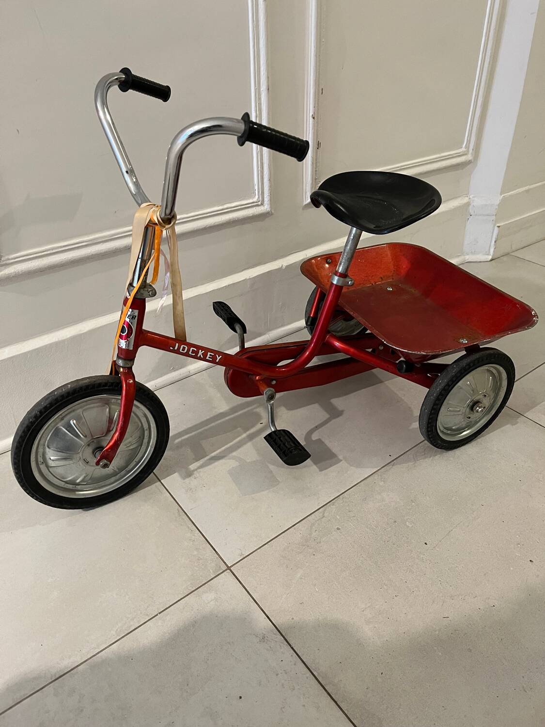 Vintage metal jockey tricycle
