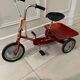 Vintage metal jockey tricycle