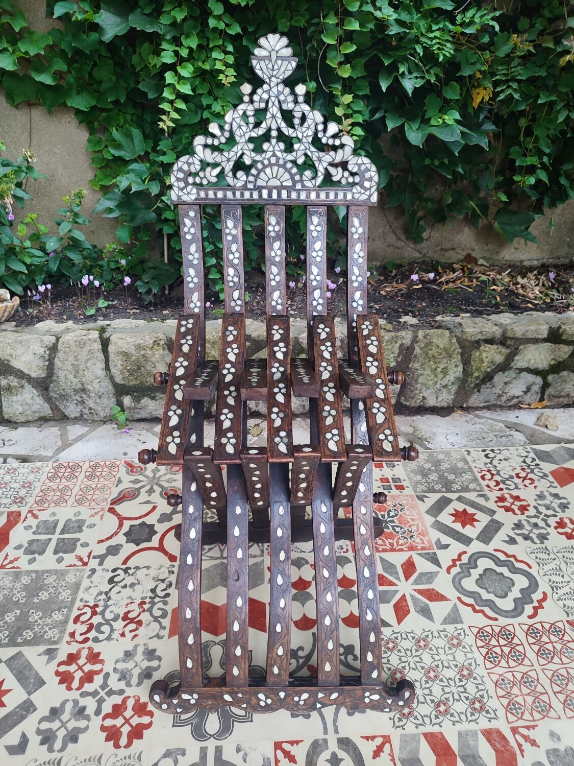Antique folding oriental chair with mother-of-pearl inlays