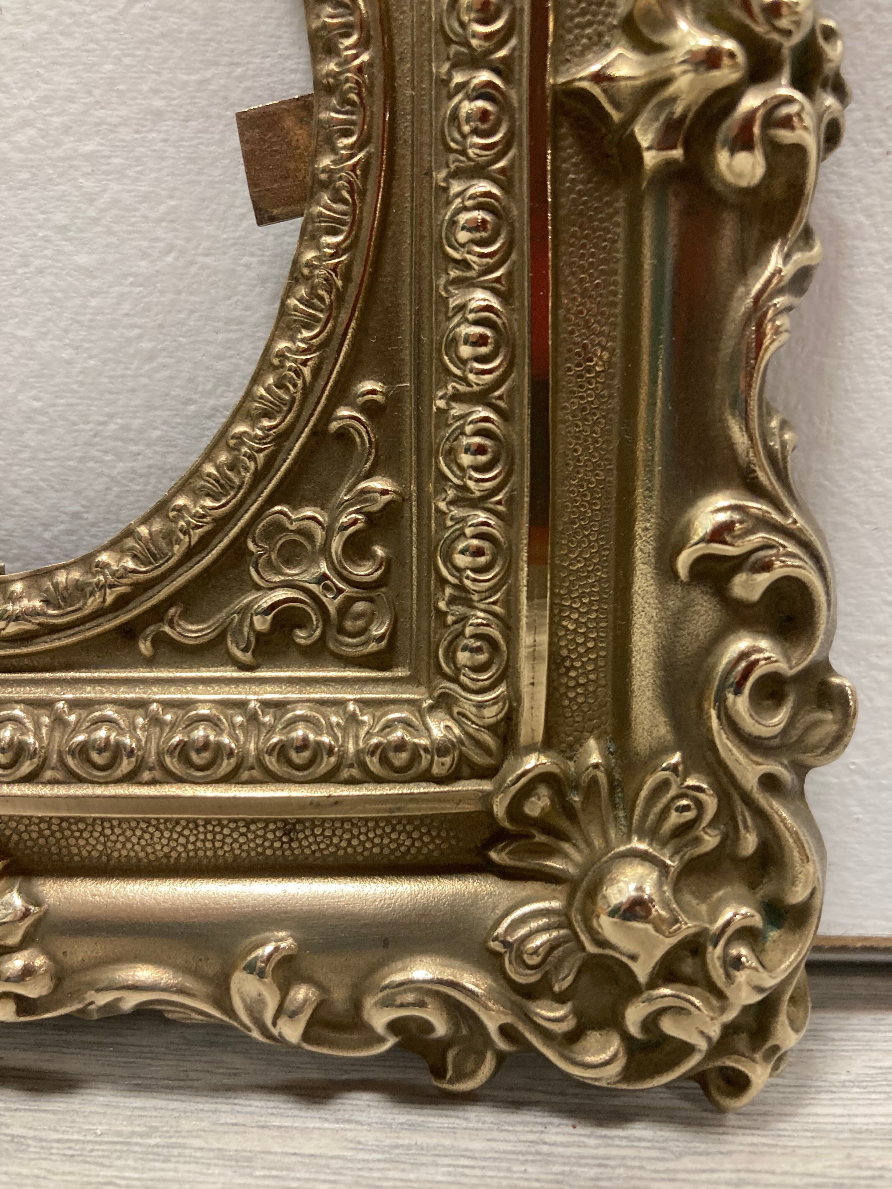 Pair of brass photo frames