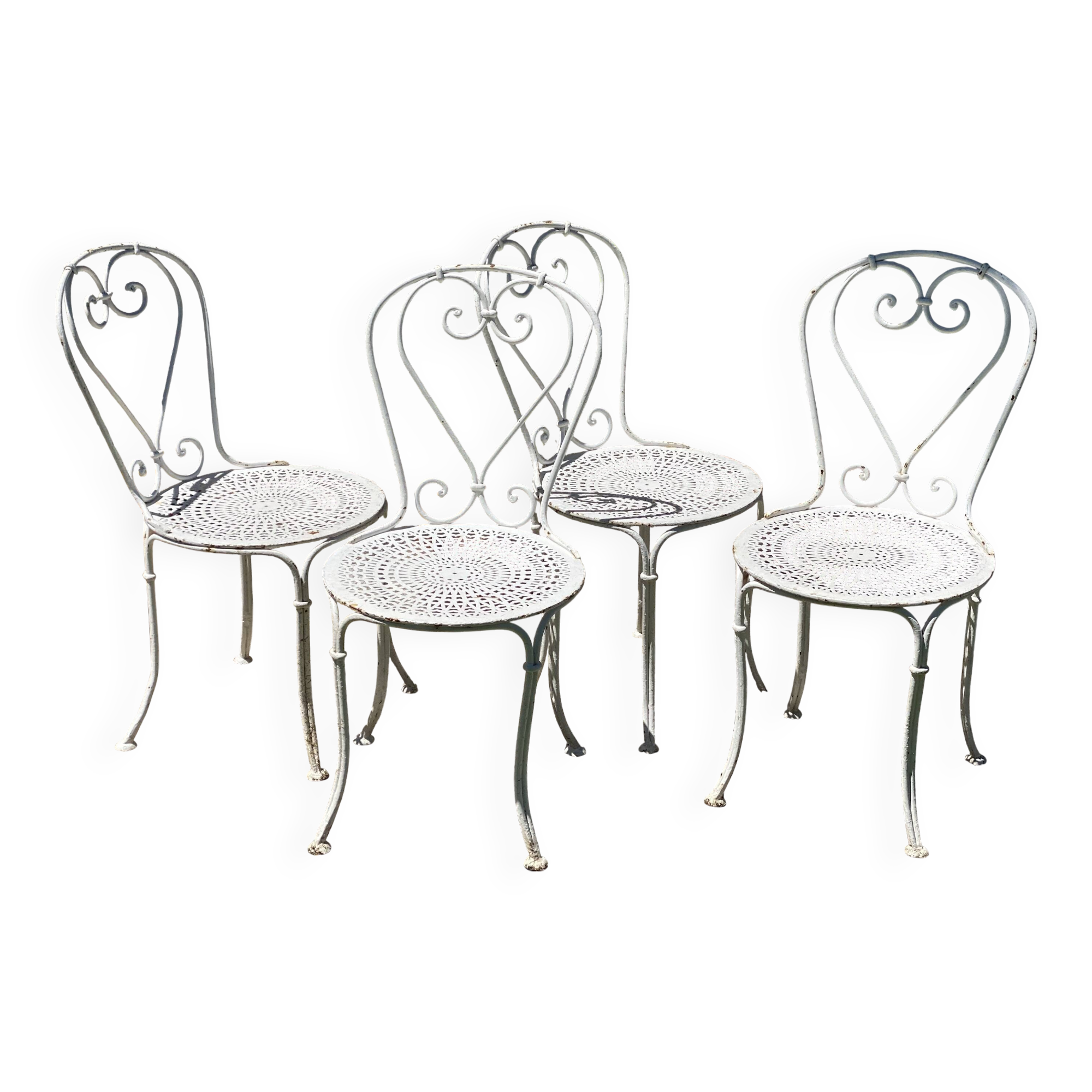 Set of 4 19th century wrought iron garden chairs with heart motif