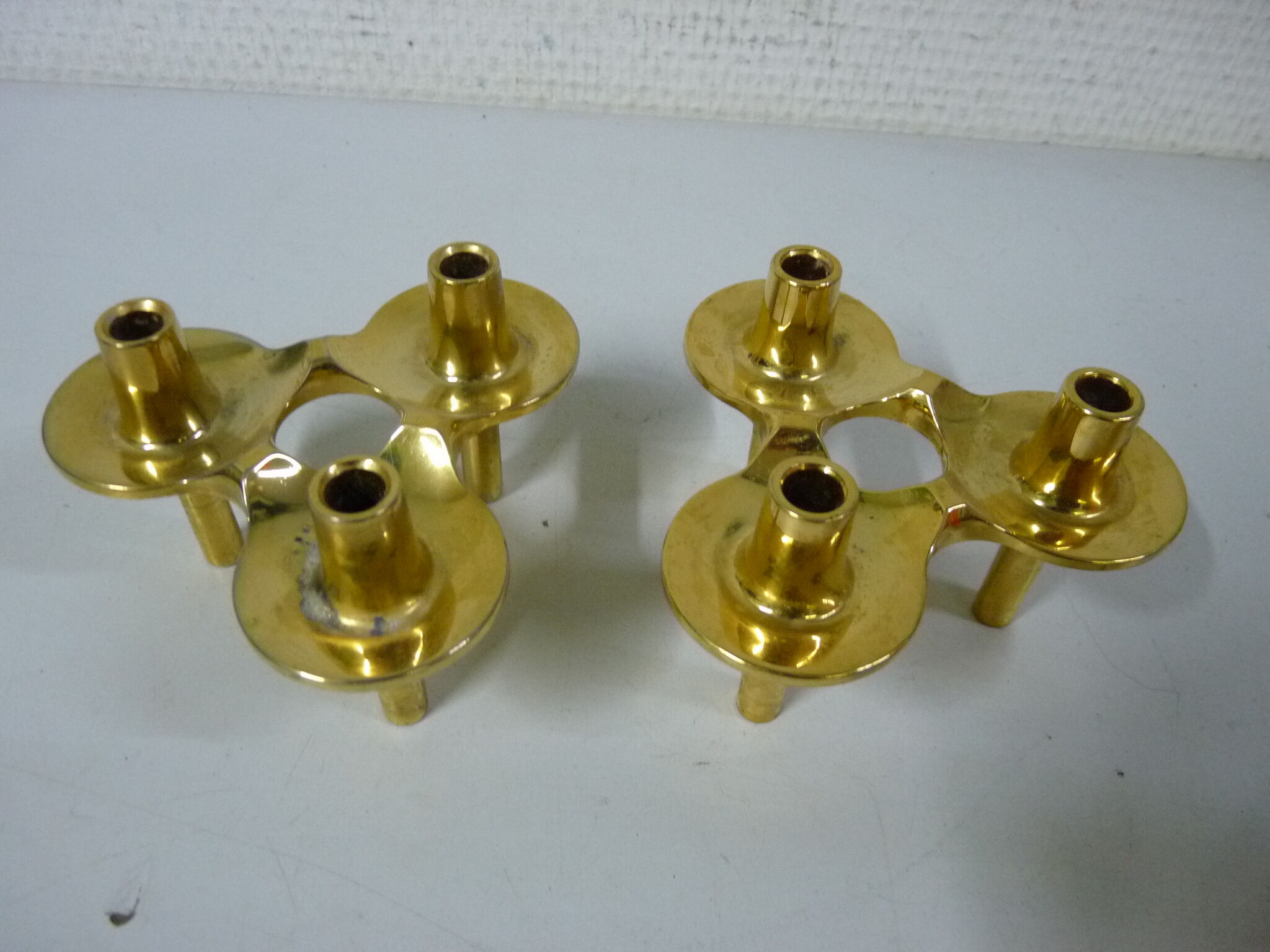 Set of 2 golden Nagel candleholders