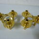 Set of 2 golden Nagel candleholders