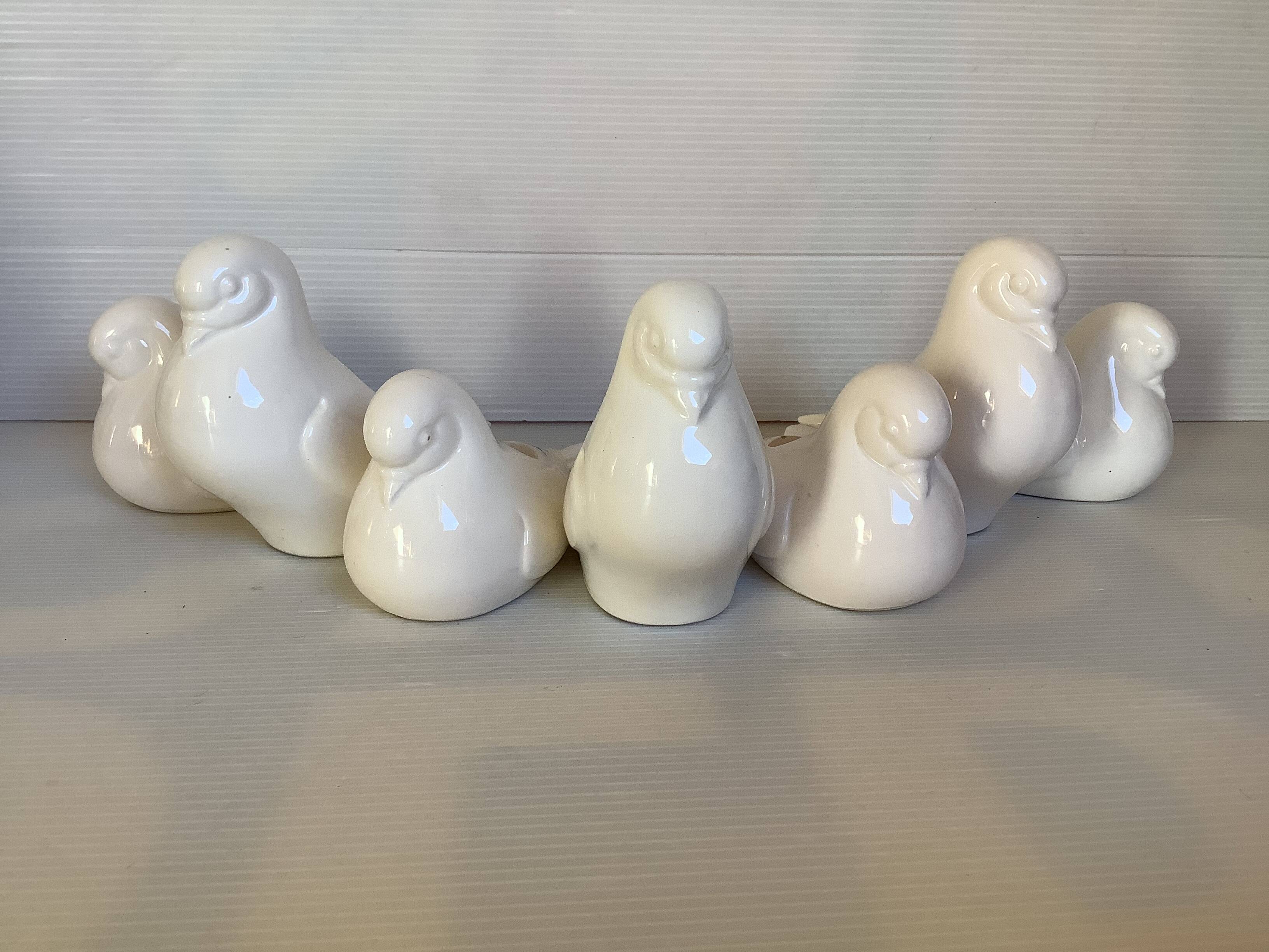 Seven dove bird candle holders