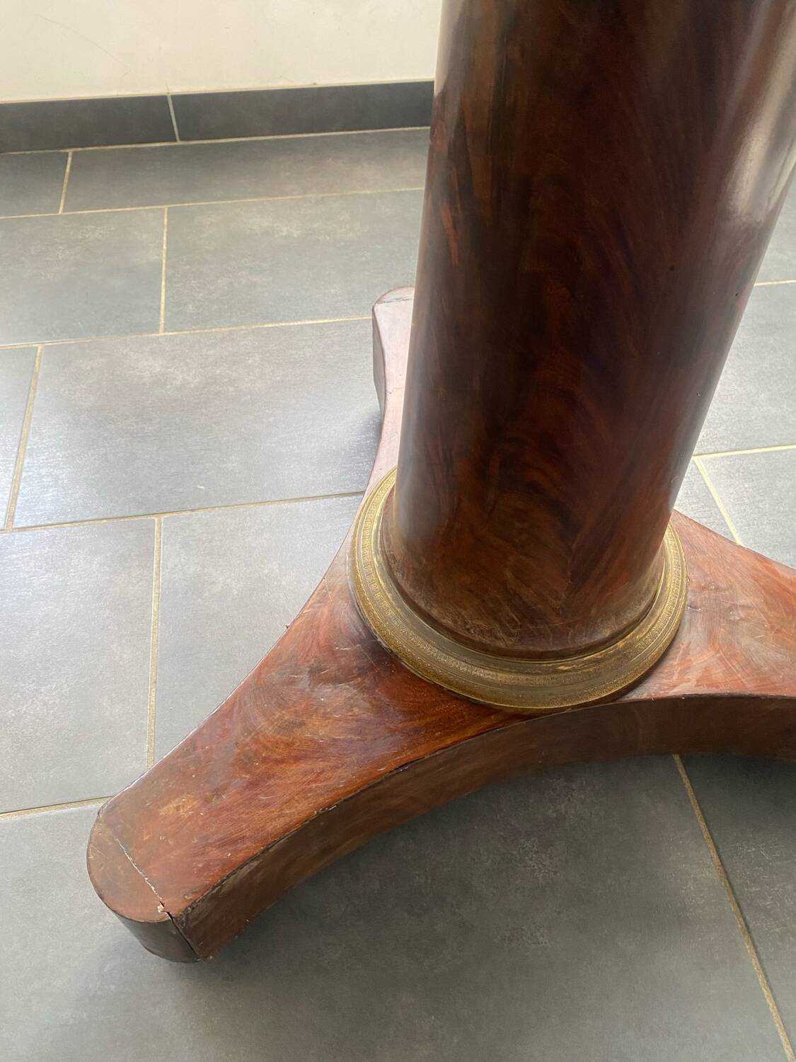 Empire period gueridon in mahogany and gilded bronze