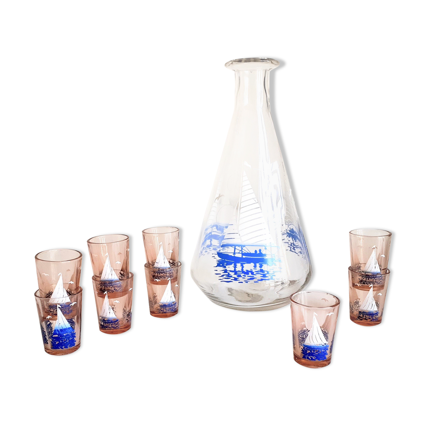 Carafe and 9 liquor glasses decorated with sailboats