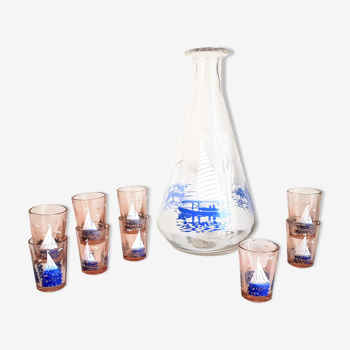 Carafe and 9 liquor glasses decorated with sailboats