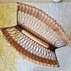 Vintage wicker and metal magazine rack
