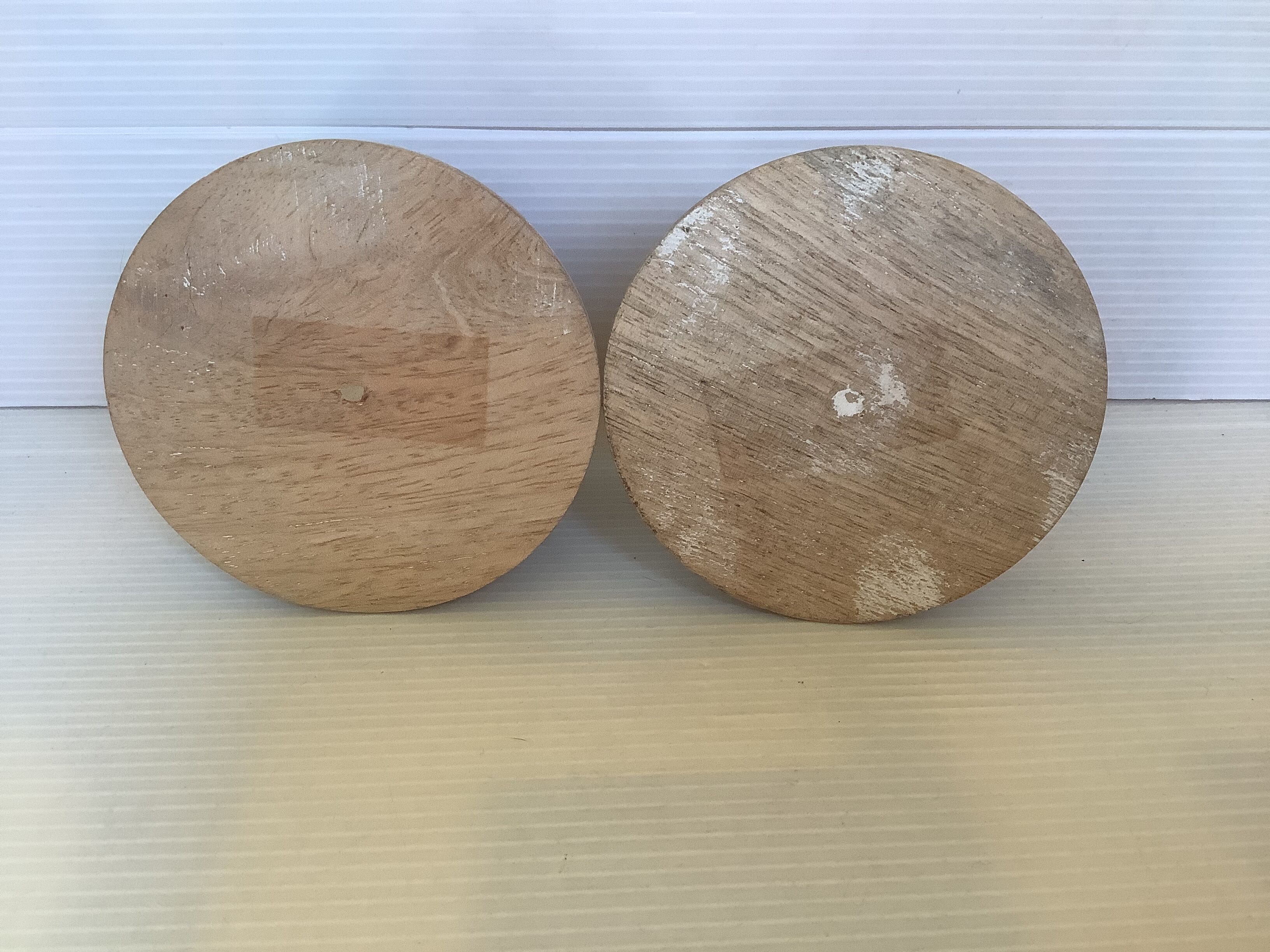 Pair of wooden candlesticks with a white effect