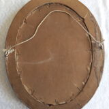 Oval frame with Art Nouveau colorized photo