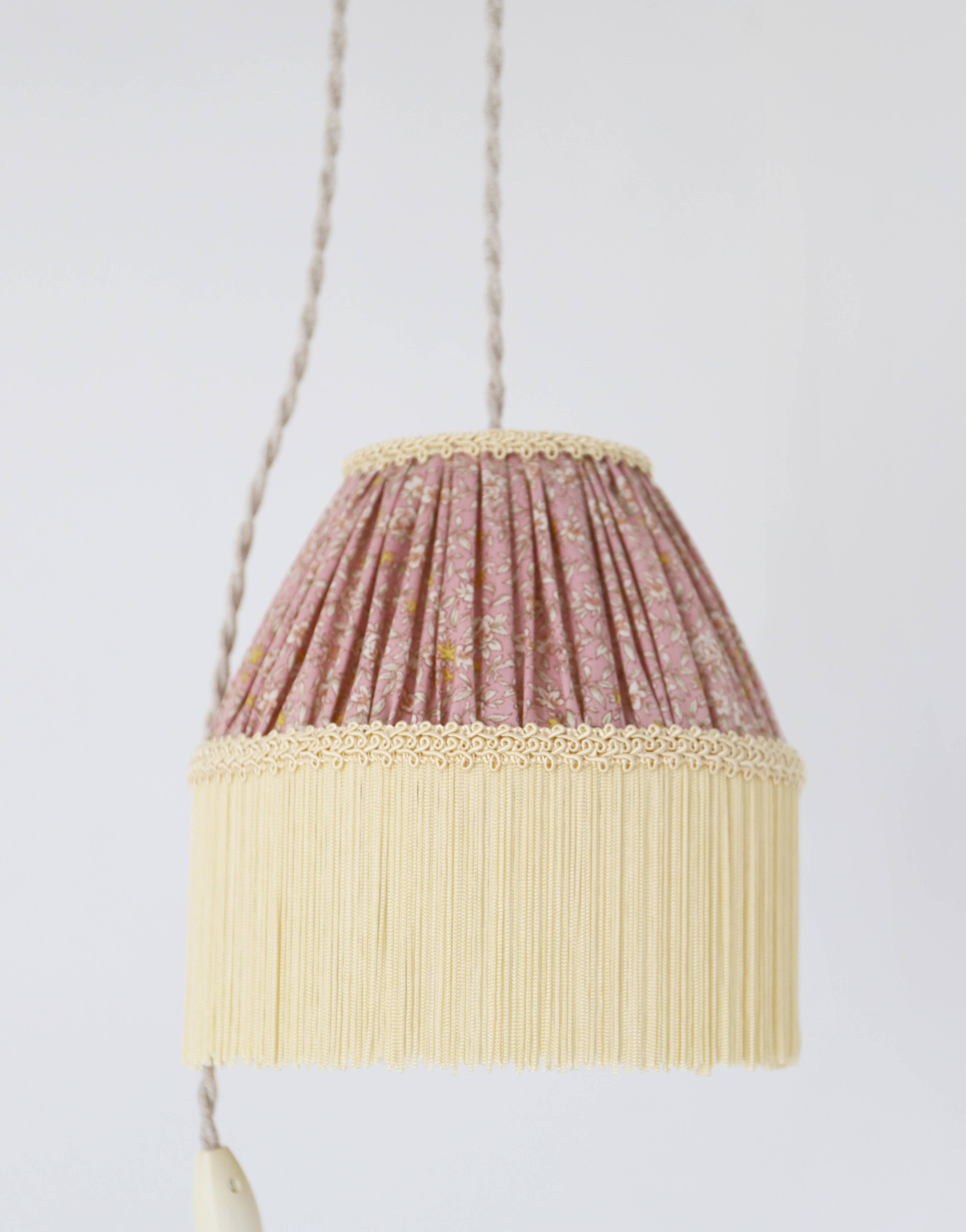 Small floral portable lamp with fringed finish