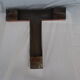 Letter of sign in ancient zinc T