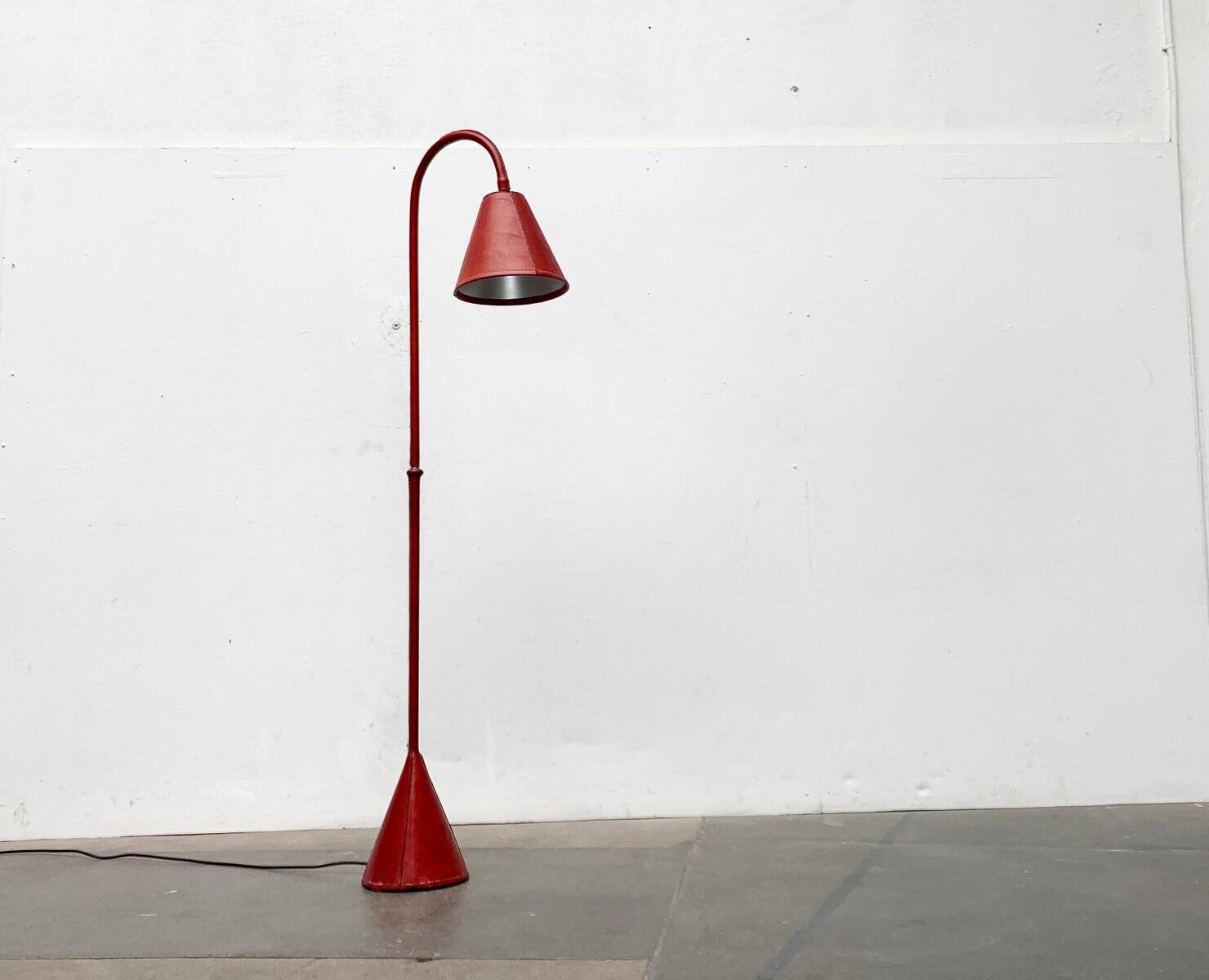 Mid-century leather floor lamp by Jacques Adnet for Valenti, Spain, 1960s.