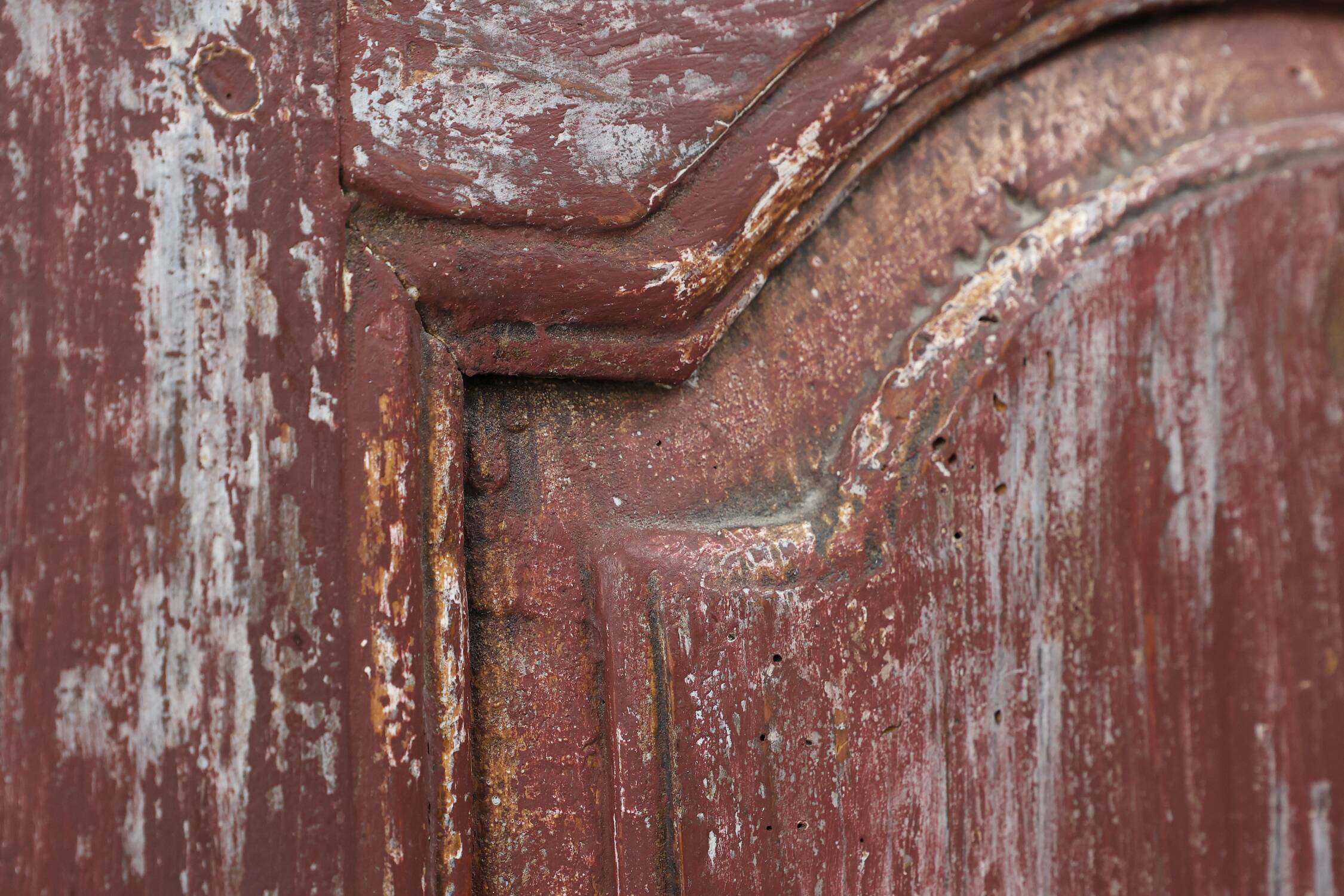 Rustic Parisian cabinet in pine wood with old burgundy paint layers, ca. 18