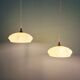 Pair of Art Deco light fixtures in light green speckled glass, 1930s.