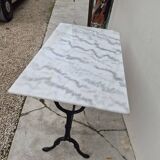Antique marble and cast iron bistro restaurant table