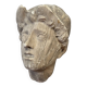 Antique plaster sculpture of a female face from the early 20th century