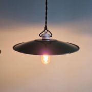 Trio of large industrial suspensions in green enamelled sheet metal.