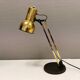 Gold coloured table lamp, Danish from Lyskaer Lighting (LB) 1980s, with black "base"