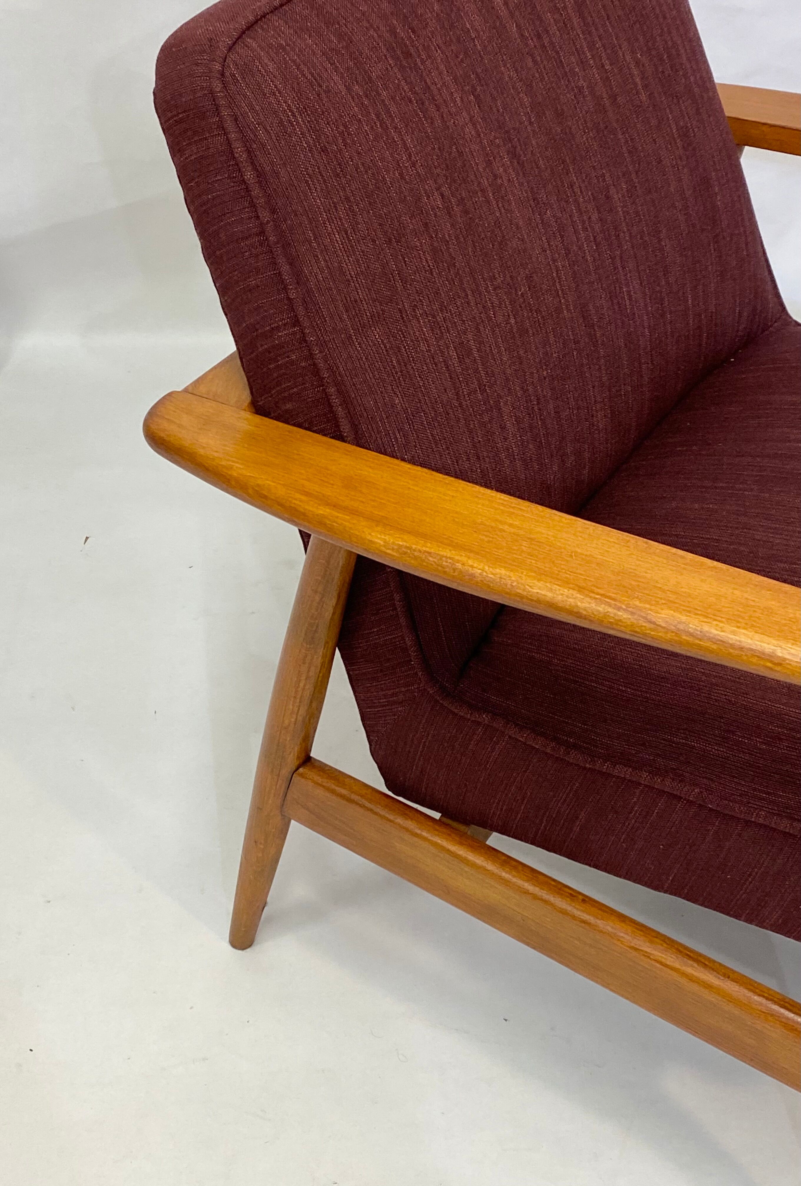 Chair created by Mr. Zieliski year 60 burgundy fabric.