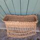 Antique wicker magazine rack